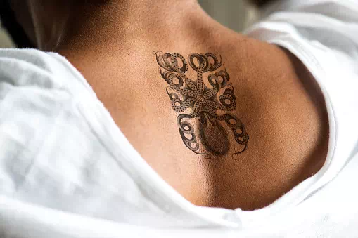 Spine tattoo design - Tattoo Design Ideas