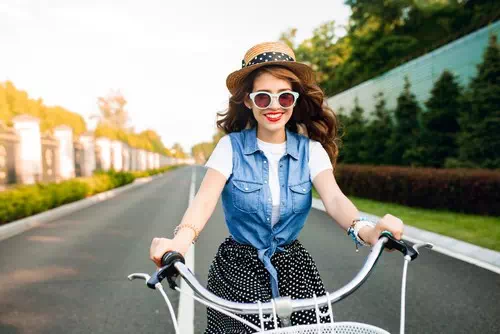 Sitting on a Bicycle with a Joyful Smile